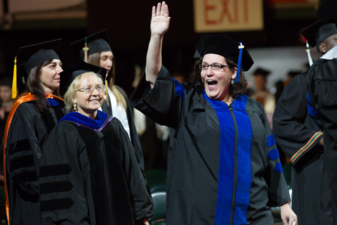 Faculty Waiving during Procession